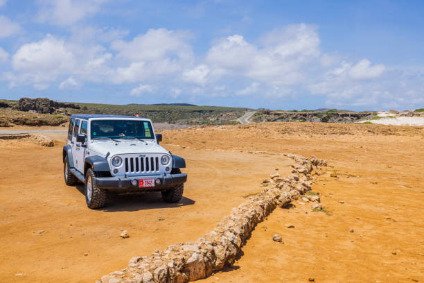 Jeep Gladiator off-road truck on rugged terrain