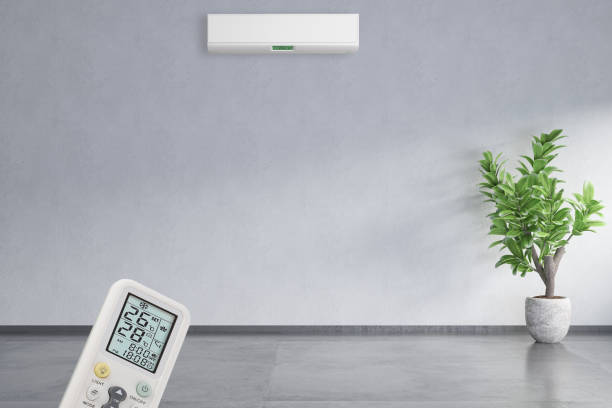 A sleek air purifier in a modern living room, purifying the air efficiently.